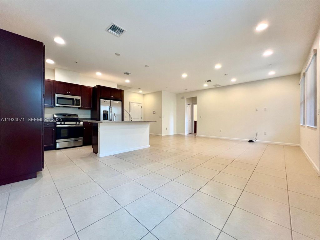 Photo of 12585 NW 32nd Mnr, Sunrise, FL 33323 (MLS # A11934071)