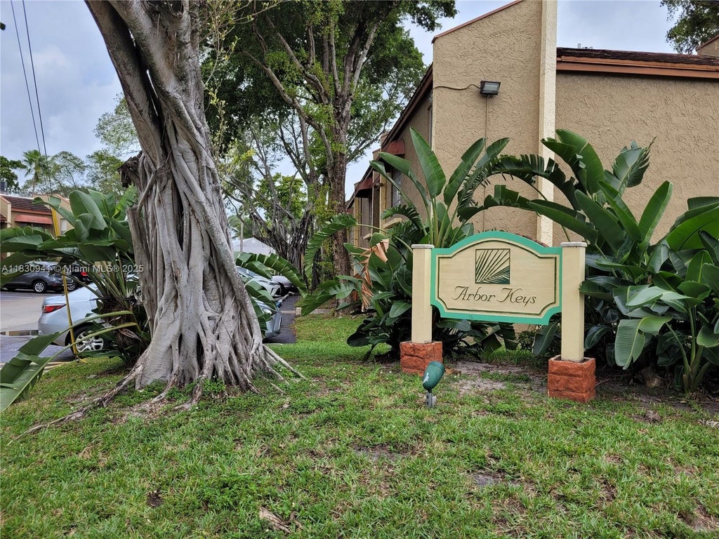 Photo of 4509 Treehouse Ln #A, Tamarac, FL 33319 (MLS # A11830941)