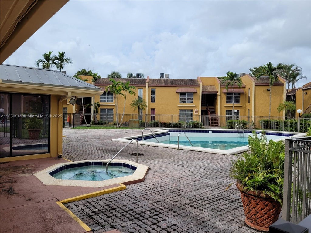 Photo of 4509 Treehouse Ln #A, Tamarac, FL 33319 (MLS # A11830941)