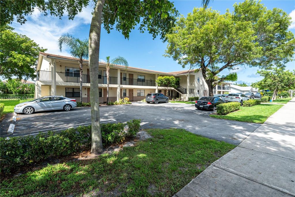 Photo of 8705 NW 38th Dr #3A, Coral Springs, FL 33065 (MLS # A11865587)