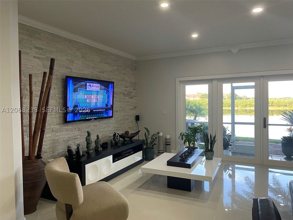 Photo of 307 SW 120th Ave #307, Pembroke Pines, FL 33025 (MLS # A12068233)