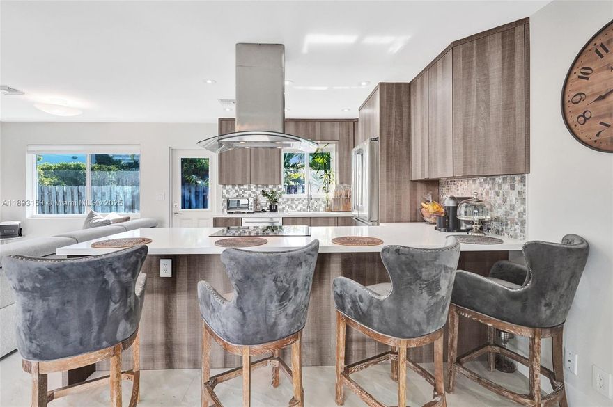 Experience luxury beachside living in this private villa, near Fort Lauderdale Beach. This completely remodeled 2BD/2BA residence features a chef’s kitchen with quartz waterfall island, high-end stainless steel appliances, and open-concept living filled with natural light. Custom-built closets offer elegant storage solutions throughout. Enjoy the oversized saltwater pool and fenced yard with a private garden—perfect for relaxing or growing seasonal fruits and vegetables. Additional features include in-unit washer & dryer, water & gas included. Two vehicles (or boat) plus guest parking. Available unfurnished for annual lease. Fast approval (24–72 hrs). Live in one of Fort Lauderdale’s most desirable beachside neighborhoods, moments from Publix, dining, and the ocean.