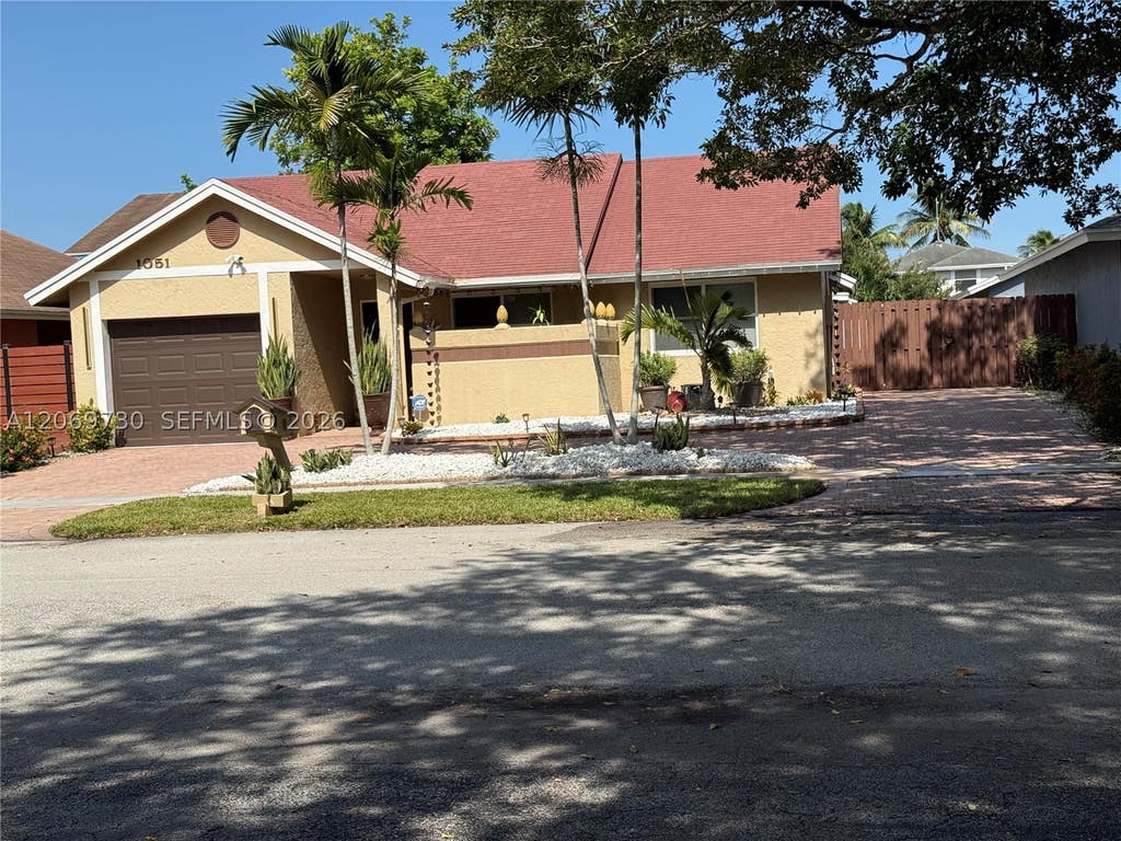 Photo of 1051 SW 99th Ave, Pembroke Pines, FL 33025 (MLS # A12069730)