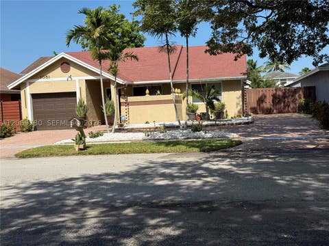 Photo of 1051 SW 99th Ave, Pembroke Pines, FL 33025 (MLS # A12069730)