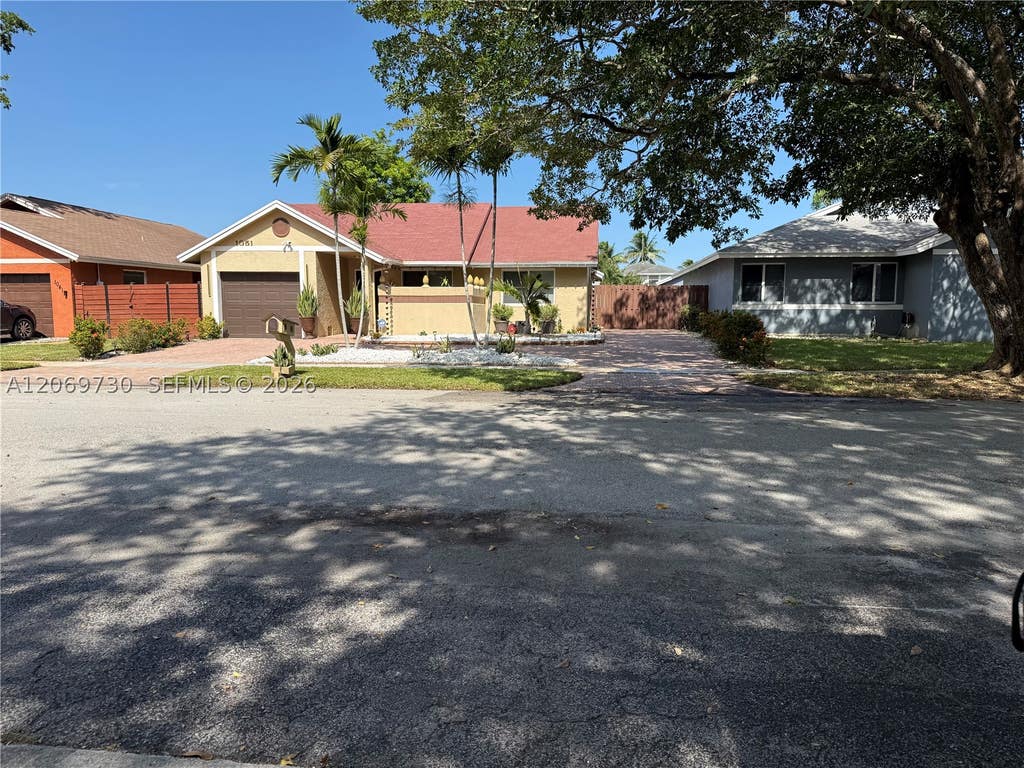 Photo of 1051 SW 99th Ave, Pembroke Pines, FL 33025 (MLS # A12069730)