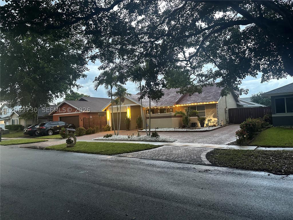 Photo of 1051 SW 99th Ave, Pembroke Pines, FL 33025 (MLS # A12069730)
