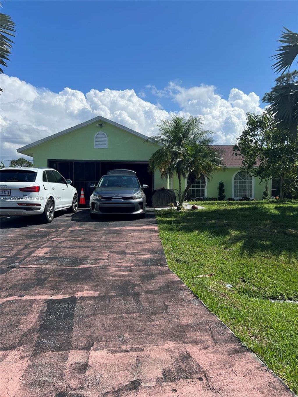 Photo of 1014 SW Mataro Ave, Port Saint Lucie, FL 34953 (MLS # A11395947)