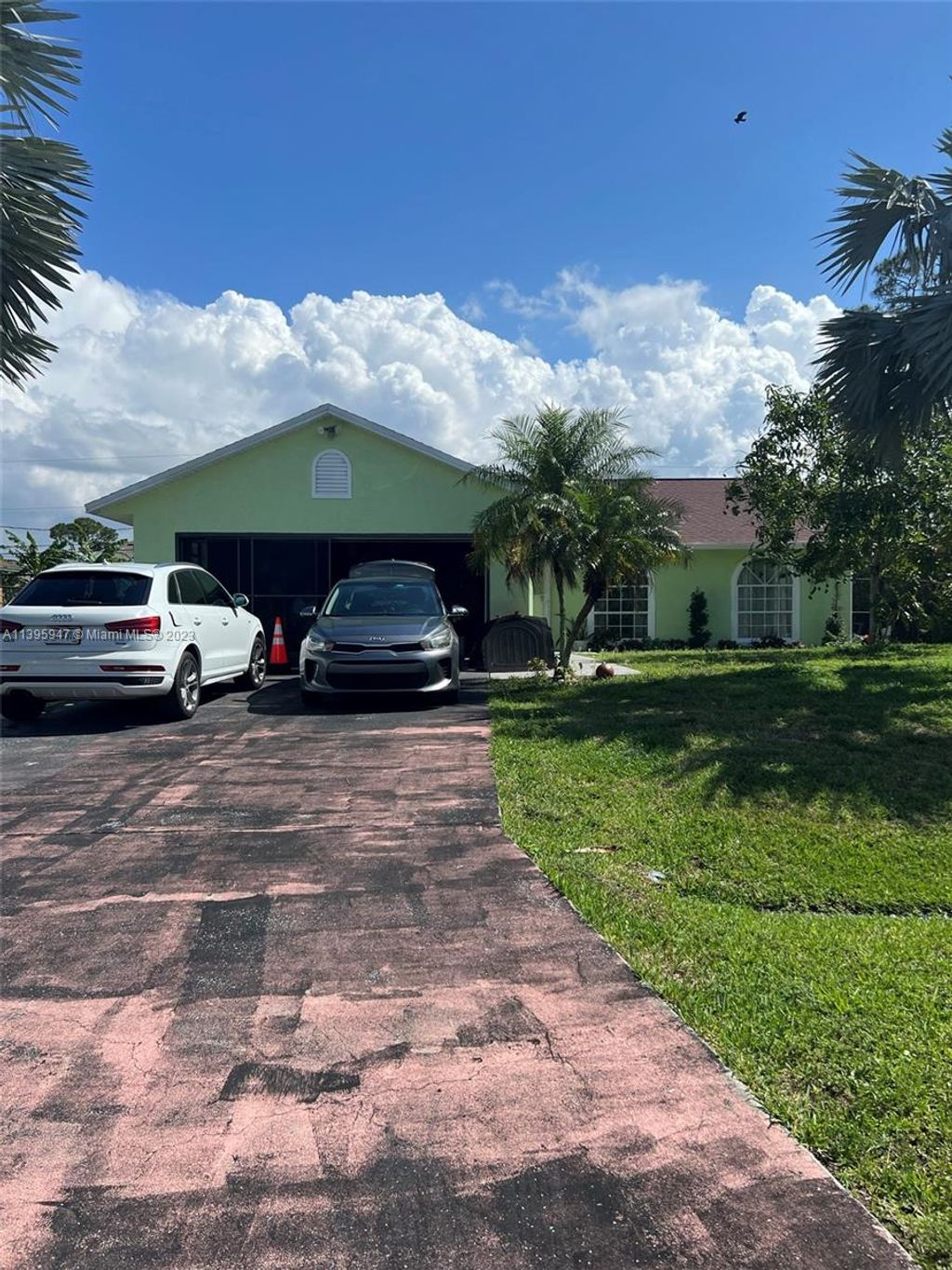 Photo of 1014 SW Mataro Ave, Port Saint Lucie, FL 34953 (MLS # A11395947)