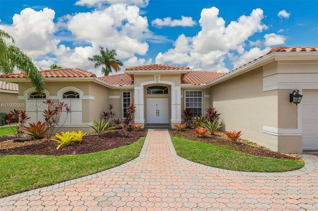 Photo of 16418 NW 14th St, Pembroke Pines, FL 33028 (MLS # A11992985)