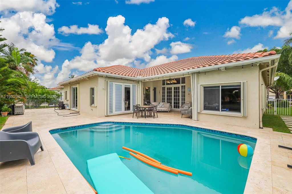 Photo of 16418 NW 14th St, Pembroke Pines, FL 33028 (MLS # A11992985)