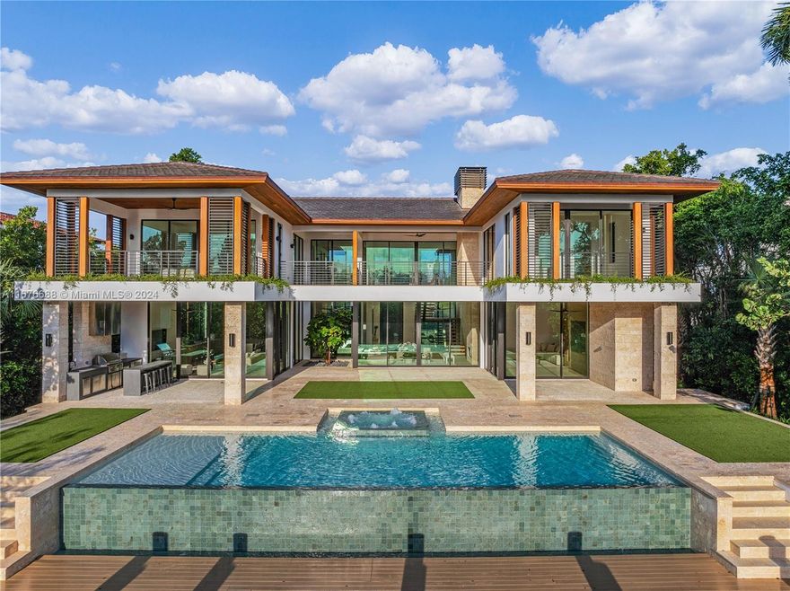 291 Costanera represents a coveted opportunity to own a new waterfront home in the most desired community in South Florida. Exquisitely designed with impeccable finishes and attention to detail, the estate features beautifully landscaped grounds, extraordinary outdoor spaces, and 100 linear feet of waterway.  291 Costanera is a luxury waterfront residence unlike any that have come before it. Indulge in a life of luxury in this 9,862 sqft home, complete with 6 bedrooms, 7 baths, 1 half bath, office, service quarters, entertainment/billiard room, chef's kitchen, 11-foot ceilings, an infinity edge pool, a new 48 ft dock, outdoor kitchen, and a Crestron smart home system. This new construction property represents a unique opportunity with an unrivaled value proposition. Completed Q4 2024.