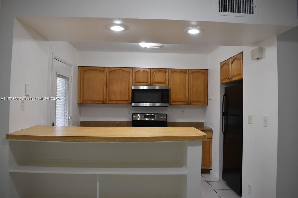 Photo of 9150 NW 38th Dr #110, Coral Springs, FL 33065 (MLS # A11871242)