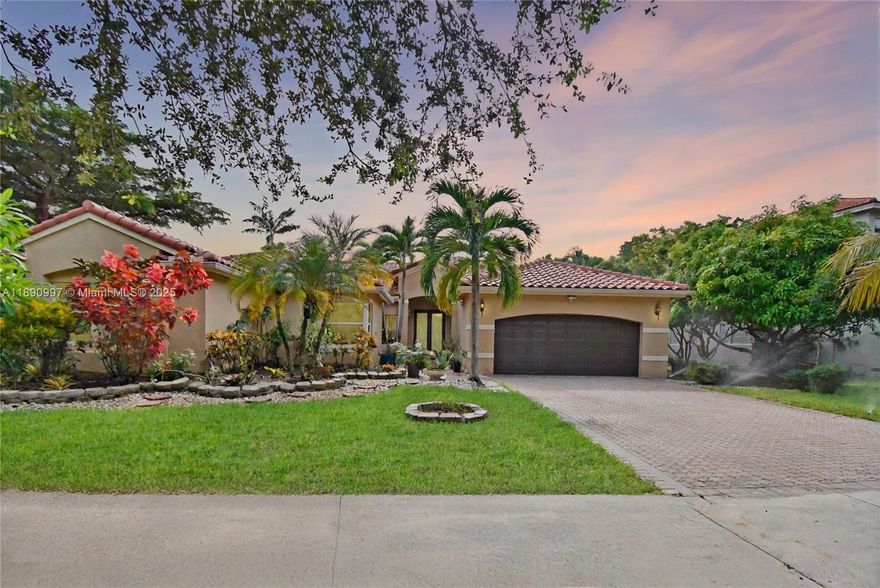Beautifully updated one-story home located in the gated community of The Lakes in Weston. Offering 5 beds, 4 baths, and nearly 3,000 SF of interior living space, this residence features a split floor plan, porcelain flooring in social areas, and tile flooring in all bedrooms. The kitchen was remodeled in 2022 with modern finishes, complemented by fully updated bathrooms and new impact windows & doors throughout. Enjoy energy efficiency with 38 solar panels powering the entire property. The spacious screened patio features a mini-golf area and room for a pool. The backyard is adorned with fruit trees and a herb garden. Located near top-rated schools, parks, dining, shopping, and major highways. Move-in ready! Schedule your private tour today!