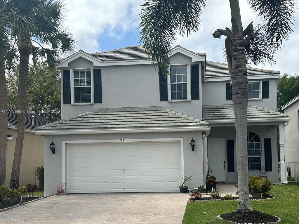 Photo of 109 Hamilton Ter, Royal Palm Beach, FL 33414 (MLS # A11775968)