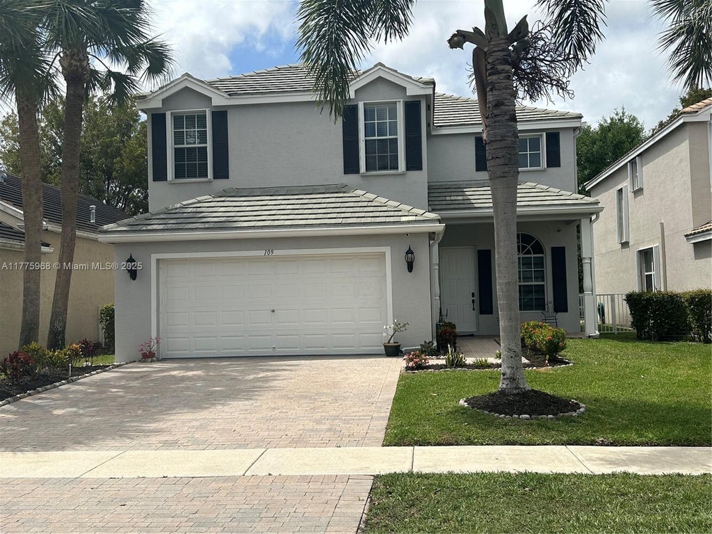 Photo of 109 Hamilton Ter, Royal Palm Beach, FL 33414 (MLS # A11775968)