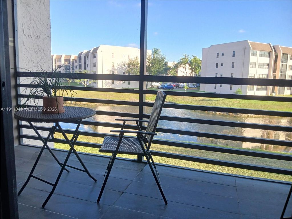 Photo of 10442 Sunrise Lakes Blvd #203, Sunrise, FL 33322 (MLS # A11911046)