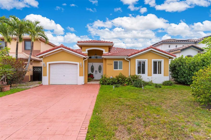 Rarely available on the market, this Big Five Homes residence is conveniently located next to the Big Five Club. The home offers great curb appeal with a double-door main entrance, high ceilings, and a spacious layout. Recent upgrades include a new roof and impact windows. Move-in ready or remodel to your own taste. Interior features tile flooring throughout, quartz countertops in the kitchen, and a large primary suite with sliding doors leading to a covered terrace—perfect for entertaining. The primary bathroom includes a whirlpool tub, separate shower, bidet, and dual sinks. Situated on a 7,511 SF waterfront lot with canal access (low clearance—ideal for kayaking and fishing) and space for a future pool. Rare one-car garage, laundry room, and solid construction throughout. Enjoy access to the Big Five Club amenities, including Olympic-size pool, tennis courts, gym, dining, and more. Just minutes from top destinations, including 3 min to Shops at Sunset Place, 5 min to Coconut Grove restaurants & cafes, 7 min to Coral Gables / Miracle Mile, 10 min to Downtown Miami, 12 min to Miami International Airport (MIA), and 5 min to Rickenbacker Causeway for quick access to Key Biscayne beaches. Also close to parks, marinas, and top-rated schools, offering the perfect combination of convenience and lifestyle