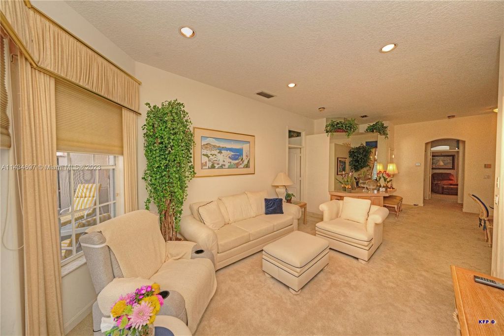 Photo of 35 Monterey Pointe Dr, Palm Beach Gardens, FL 33418 (MLS # A11434697)