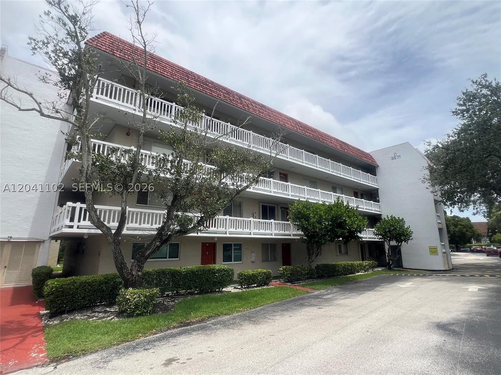 Photo of 3571 Inverrary Dr #307, Lauderhill, FL 33319 (MLS # A12041102)