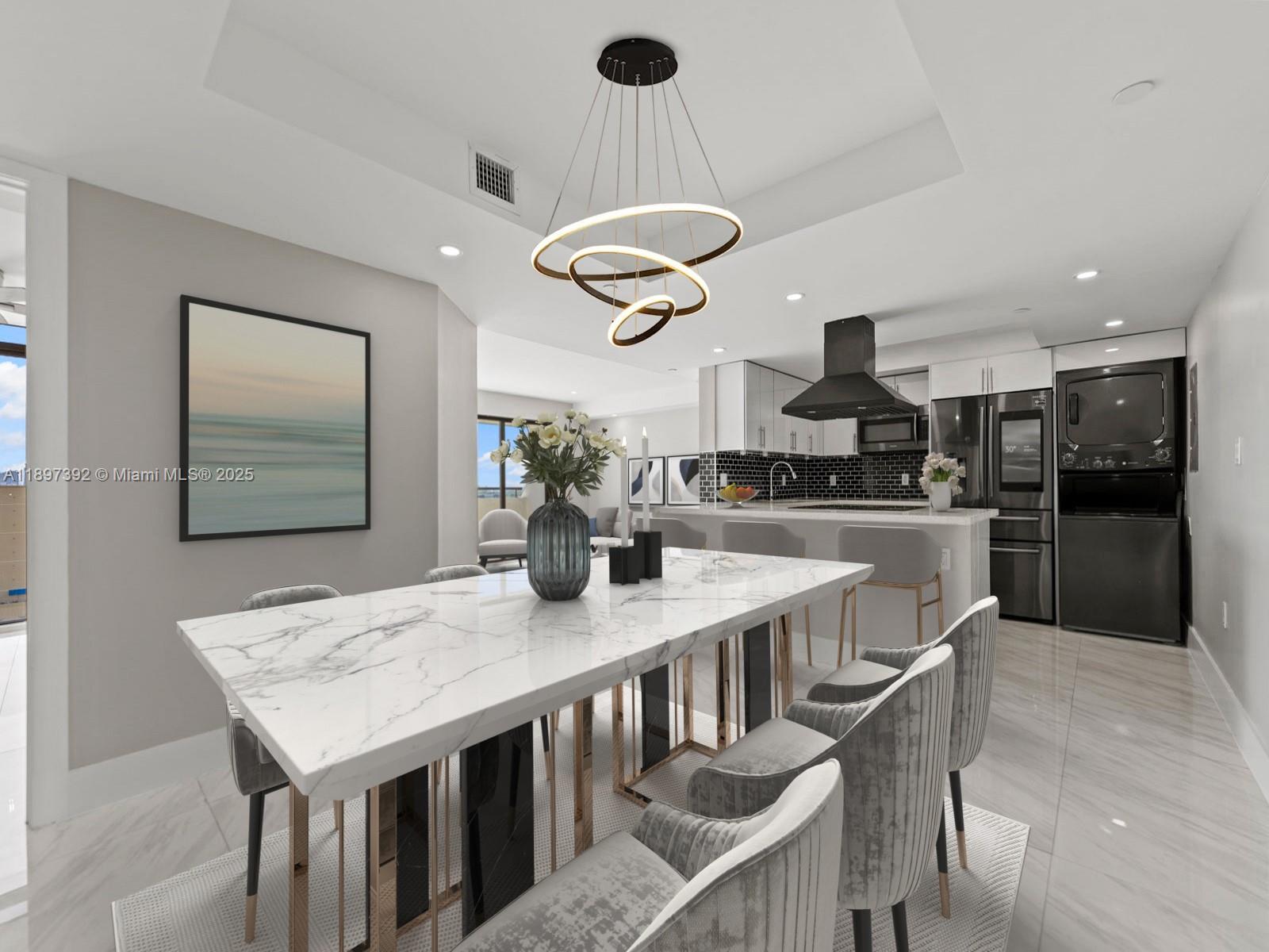 Step into Penthouse 1601 of Gables Park Tower Condo for luxurious Coral Gables living. This fully renovated condo features impact windows, impact slider doors that fully open to either side, porcelain tiles, GE washer/dryer, & custom built-out closets. Fall in love w/ the modern kitchen boasting quartz countertops & dark stainless steel Samsung appliances for a sleek finish. Spacious & bright, the primary bedroom offers a walk-in closet & private ensuite bathroom. Enjoy the sunrise from the floor-to-ceiling windows in both bedrooms. Step onto the open balcony & relish in an expansive city view overlooking the pool. 2 parking spaces near elevator & a small storage unit + water included. HOA fee is $1,080.56/mo. Seller will pay off special assessment at closing.