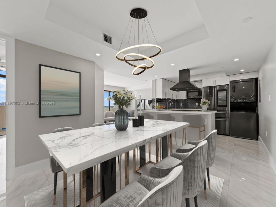 Step into Penthouse 1601 of Gables Park Tower Condo for luxurious Coral Gables living. This fully renovated condo features impact windows, impact slider doors that fully open to either side, porcelain tiles, GE washer/dryer, & custom built-out closets. Fall in love w/ the modern kitchen boasting quartz countertops & dark stainless steel Samsung appliances for a sleek finish. Spacious & bright, the primary bedroom offers a walk-in closet & private ensuite bathroom. Enjoy the sunrise from the floor-to-ceiling windows in both bedrooms. Step onto the open balcony & relish in an expansive city view overlooking the pool. 2 parking spaces near elevator & a small storage unit + water included. HOA fee is $1,080.56/mo. Seller will pay off special assessment at closing.