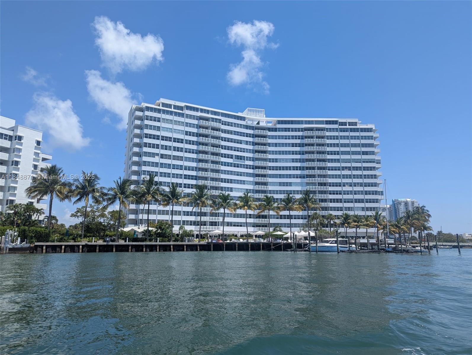 Discover Your Private Oasis at Belle Plaza on the Venetian Causeway! Wake up to birdsong in this 1 bed, 1.5 bath condo on the ground floor with a unique side entrance, offering exclusive, discrete access. Enjoy high ceilings perfect for a mezzanine and a peaceful, neighbor-free living experience. The garden-facing unit offers a private, house-like feel in a resort setting. Plus, access over 2,000 sq ft of space next door at the card room, ideal for working or relaxing facing the pool area. The interior boasts hurricane impact windows, a modern kitchen with stainless steel appliances and granite countertops, updated bathrooms, large closets, and even renovated A/C ducts—no further work needed! Schedule a showing today to own this piece of paradise with unmatched privacy and convenience!