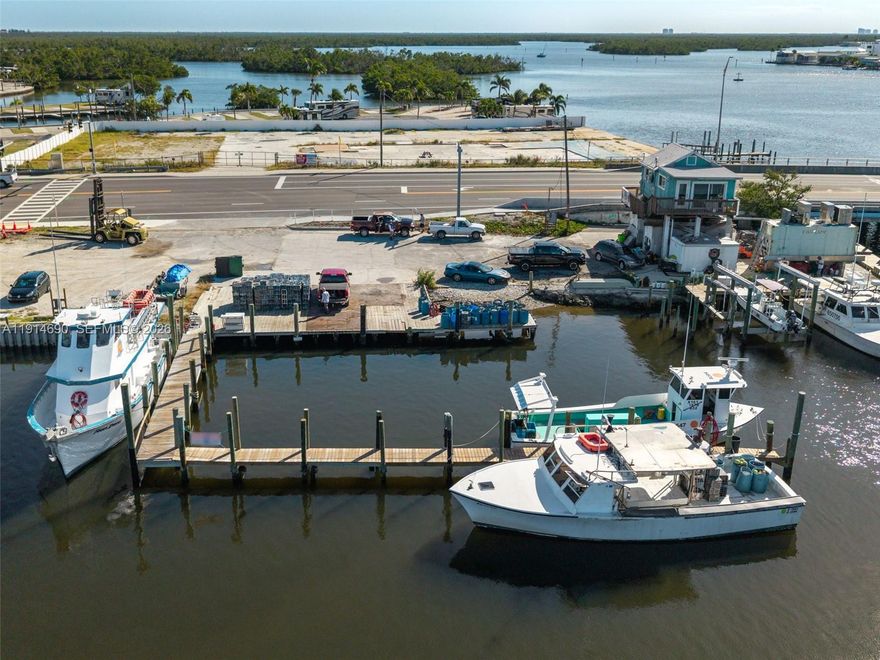 Prime Bayfront Commercial Property – Minutes from Fort Myers Beach! Located on San Carlos Blvd, just one mile from downtown Fort Myers Beach, this waterfront commercial parcel offers direct Gulf access and endless potential. Surrounded by successful marine and tourism businesses—fishing charters, boat rentals, parasailing, tiki tours—this site ensures high visibility and synergy. Within walking distance to restaurants and bars, with owned submerged land and a large dock ready for immediate use, it’s ideal for marine, hospitality, or eco-tourism ventures. Rare investment in a thriving coastal corridor.