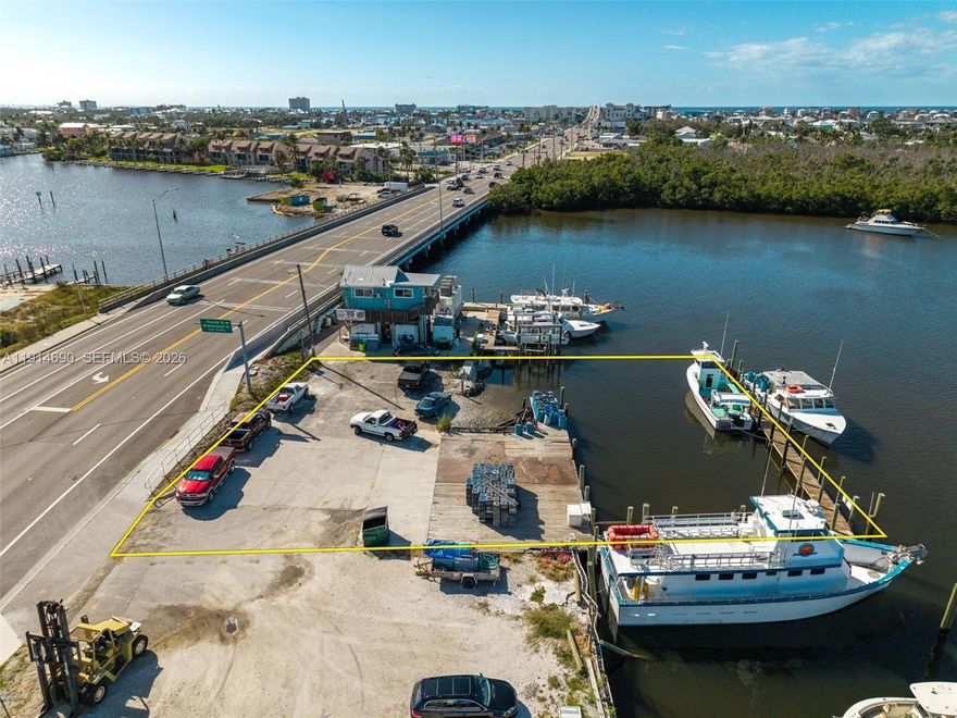 Prime Bayfront Commercial Property – Minutes from Fort Myers Beach! Located on San Carlos Blvd, just one mile from downtown Fort Myers Beach, this waterfront commercial parcel offers direct Gulf access and endless potential. Surrounded by successful marine and tourism businesses—fishing charters, boat rentals, parasailing, tiki tours—this site ensures high visibility and synergy. Within walking distance to restaurants and bars, with owned submerged land and a large dock ready for immediate use, it’s ideal for marine, hospitality, or eco-tourism ventures. Rare investment in a thriving coastal corridor.