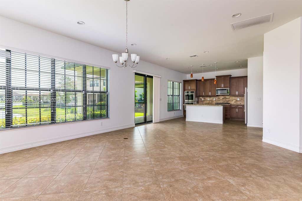 Photo of 9350 Solstice Cir, Parkland, FL 33076 (MLS # A12030365)