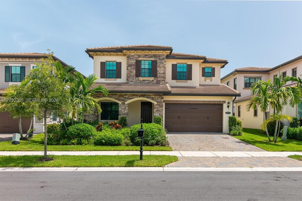 Photo of 9350 Solstice Cir, Parkland, FL 33076 (MLS # A12030365)