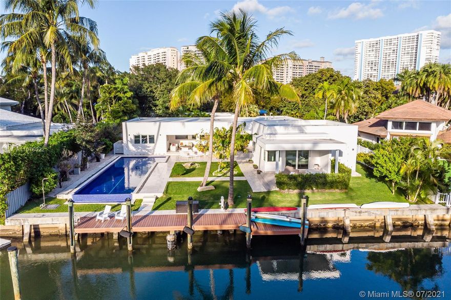Boater’s dream modern haven right on the water! Brand new 4BD/4.5BA one-story home located in one of Key Biscayne’s most desirable waterways. House sits on 15,000SF Lot with lot size of 100x150 with a 120ft sea wall & direct ocean access. Enjoy breathtaking Sunset Skies from every room. Formal dining and living room open directly to covered patio area overlooking beautiful blue-tiled Lap Pool & the waterway. Kitchen features snack-bar counter, Miele & Viking Gas Appliances & wine coolers. High-Impact windows & window treatments throughout; black-outs in bedrooms. Two oversized & spacious Master Suites; all bedrooms en-suite. Large pantry area including laundry room. Beautiful & fine modern finishes. Perfect for entertaining & enjoying living life on the water
