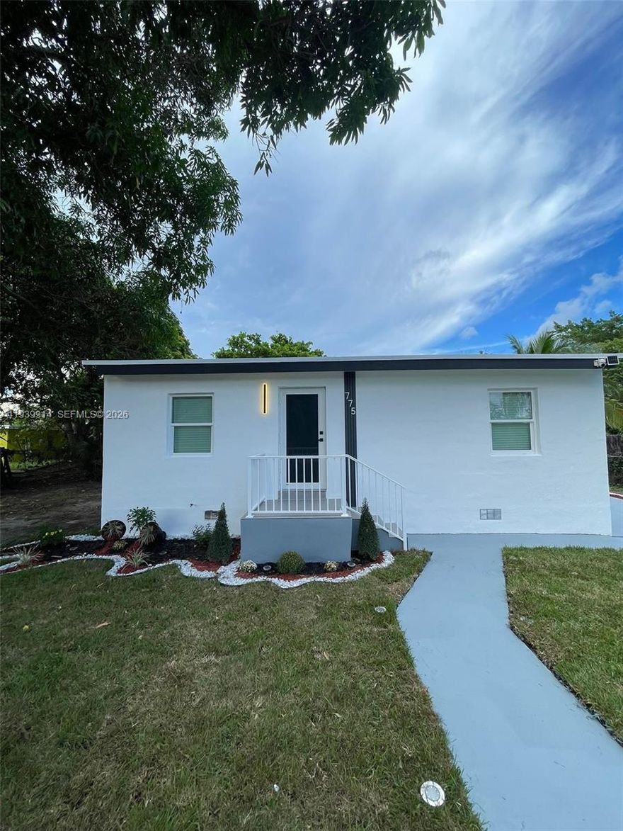 Seller willing to contribute $10,000 toward Buyer's closing costs on this completely remodeled 2/1 home. New kitchen with stainless steel appliances, new bathroom, new A/C, new floors, freshly painted inside and outside. Plenty of parking, gate for added security.  Room for a pool, r/v, boat.  Great, quiet area. Perfect for investors of first time buyers.