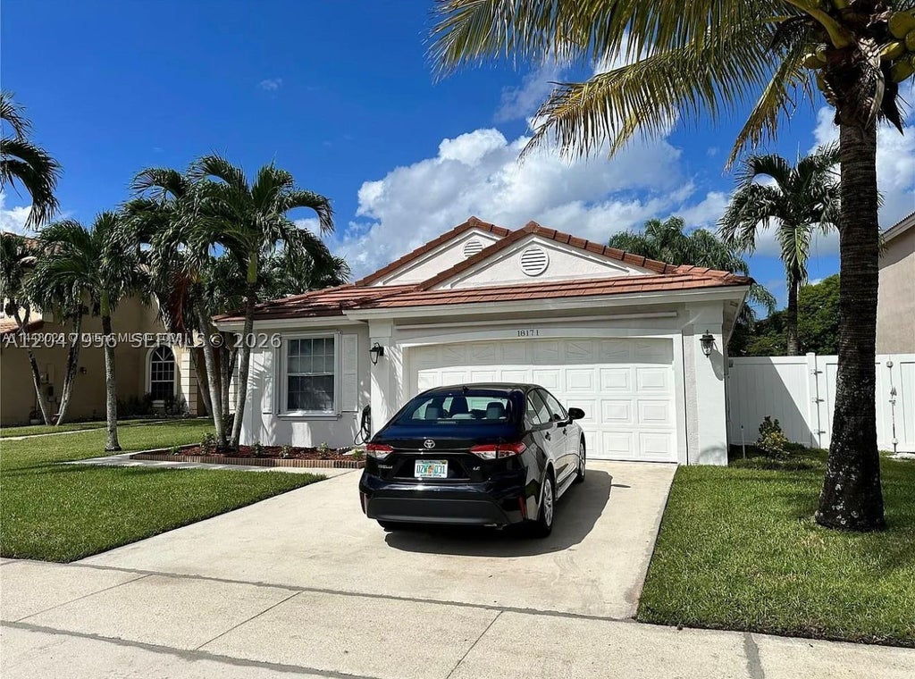 Photo of 18171 NW 18th St, Pembroke Pines, FL 33029 (MLS # A12047956)