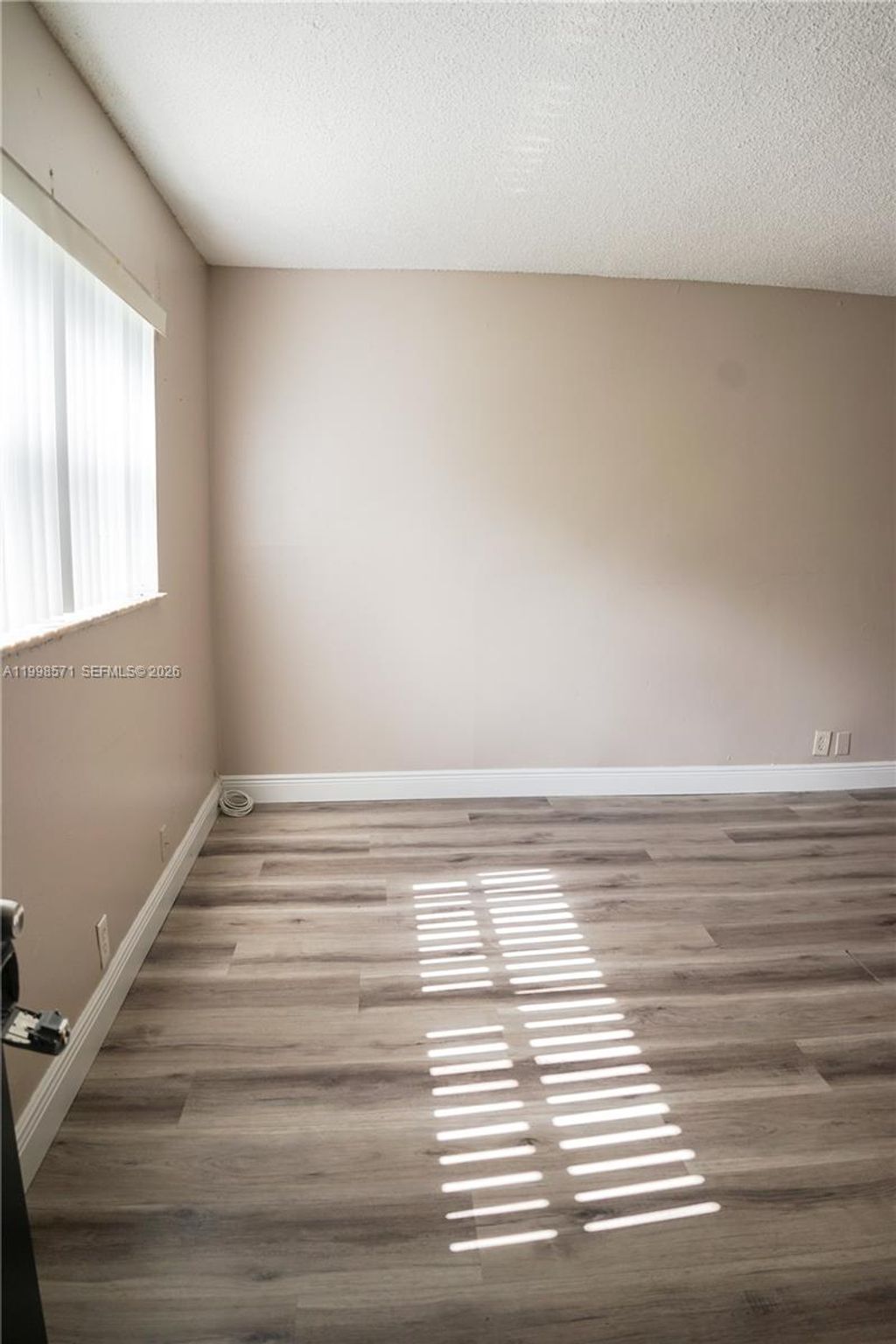 Photo of 4280 Woodside Dr #12, Coral Springs, FL 33065 (MLS # A11998571)