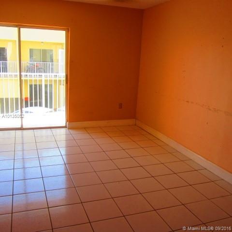 Spacious condo in the desirable West Hialeah area with a two level layout. Large kitchen with bedrooms located in the second floor.