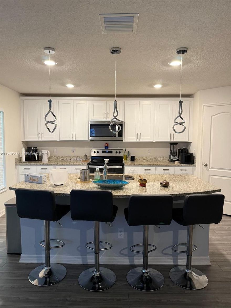 Beautiful new construction (2024) home situated on a spacious corner lot in desirable Port St Lucie neighborhood. This property offers plenty of outdoor space and privacy, perfect for entertaining, or future additions. Featuring 5 bedrooms and 3 baths with modern finishes and a layout ideal for comfortable living.
Enjoy upgraded living with a water filtration system that alkalinizes the water, providing added quality of convenience throughout the home.
Move-in ready and centrally located near major roads, shopping, dining, and schools-this is a fantastic opportunity to own a newer home with premium features.