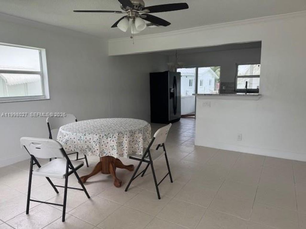 Photo of 7005 NW 66th Ter, Tamarac, FL 33321 (MLS # A11998027)