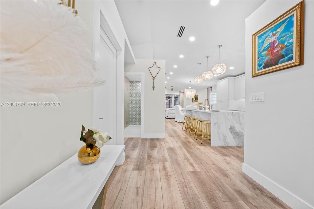 Photo of 1077 NW 170th Ave, Pembroke Pines, FL 33028 (MLS # A12000759)