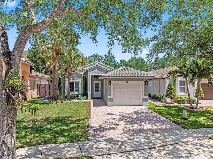 Beautifully remodeled 4-bedroom, 3-bathroom home in the heart of Pembroke Pines! This move-in ready residence has been thoughtfully redesigned with both style and functionality in mind. The interior was completely renovated by a professional interior designer, featuring modern finishes, open living spaces, and a seamless flow throughout.

The home has been upgraded for accessibility, including widened doorways and a custom roll-in shower, making it ideal for wheelchair access without compromising on design.

Enjoy indoor-outdoor living with a portion of the backyard enclosed and air-conditioned—perfect for entertaining, relaxing, or creating a versatile gathering space. The roof was replaced in 2023, offering peace of mind for years to come.

Converted to maximize living space, the home is now a full 4/3 with no garage, providing ample room for families or guests. Conveniently located near top-rated schools, shopping, dining, and major highways.

A rare combination of modern design, accessibility, and functionality—this home is a must-see!
