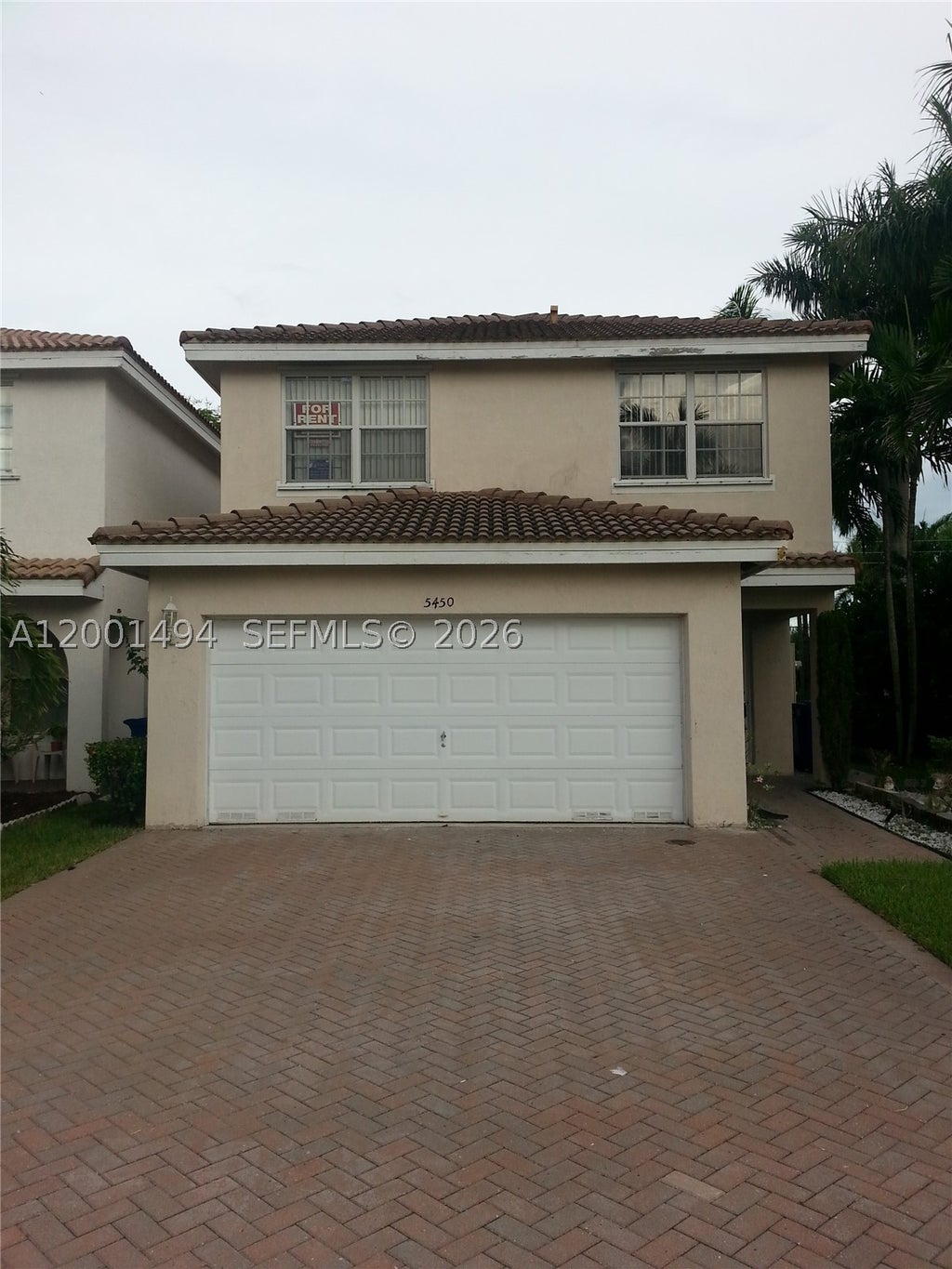 Photo of 5450 NW 94th Ter, Sunrise, FL 33351 (MLS # A12001494)