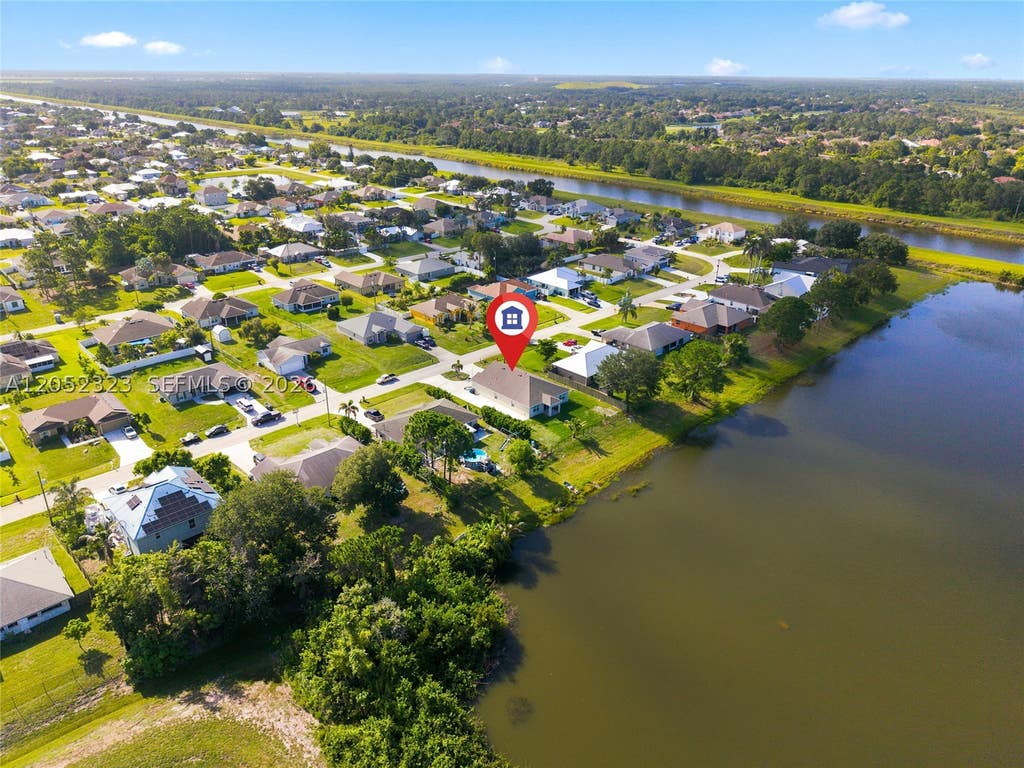 Photo of 4650 SW Babylon St, Port St Lucie, FL 34953 (MLS # A12052323)
