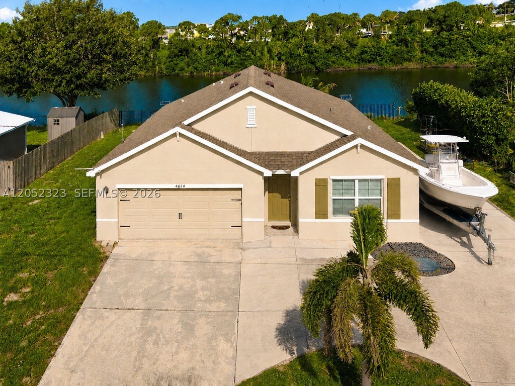 Photo of 4650 SW Babylon St, Port St Lucie, FL 34953 (MLS # A12052323)