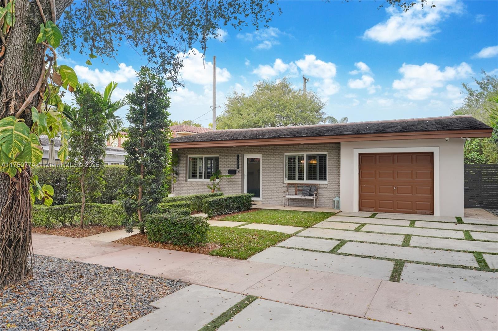 This impeccably renovated Coral Gables home exudes modern elegance with its open-concept, light-filled living areas that flow seamlessly into stylish outdoor entertaining spaces. A stunning chef’s kitchen, spacious living room, elegant dining area, and office nook/breakfast room make this home ideal for everyday living and hosting guests. Three generously sized bedrooms with ample closet space, along with two exquisitely renovated bathrooms, offer a peaceful retreat. Porcelain floors add to the home's refined interiors, while impact windows and doors, complemented by interior shutters, offer both elegance and security. The 2022 flat tile roof adds style and durability to this extraordinary home. A true gem for comfortable living and effortless entertaining!