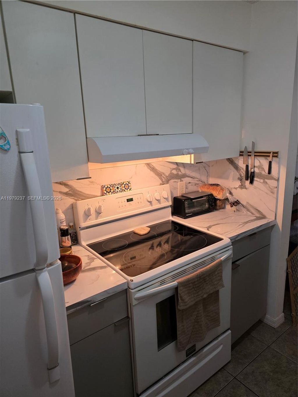 Photo of 12148 St Andrews Pl #209, Miramar, FL 33025 (MLS # A11979237)