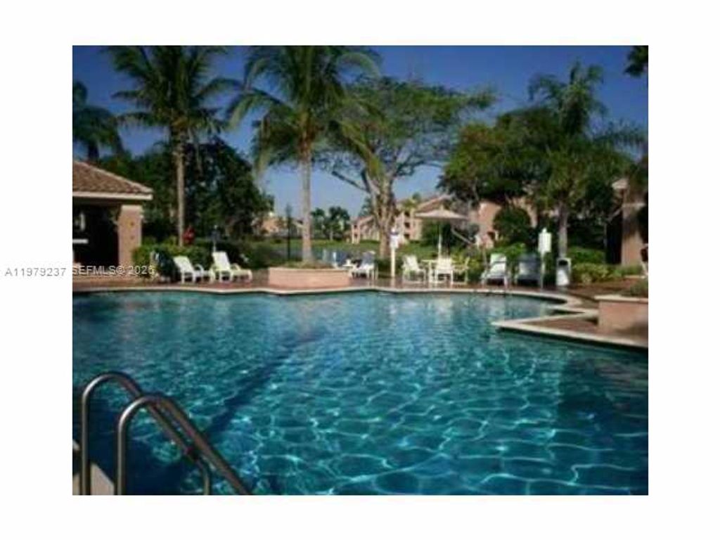 Photo of 12148 St Andrews Pl #209, Miramar, FL 33025 (MLS # A11979237)