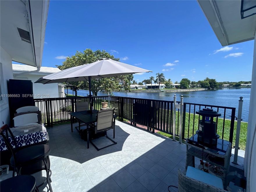 Waterfront 55+ home offering exceptional value in Tamarac. Features a brand-new roof (2026) with transferable warranty, providing long-term peace of mind and reducing insurance concerns. Enjoy wide lake views and a relaxing backyard ideal for outdoor living, entertaining, or simply unwinding by the water. The home offers a bright interior with comfortable living spaces and abundant natural light throughout. Low HOA of just $98/month keeps ongoing costs affordable. Conveniently located near shopping, dining, and major roadways. A great opportunity to own a well-priced waterfront property combining value, comfort, and a peaceful lifestyle setting.