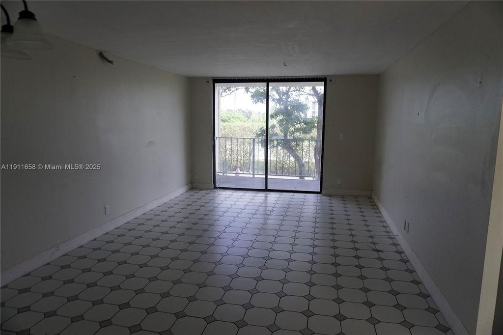 Photo of 6195 Rock Island Rd #204, Tamarac, FL 33319 (MLS # A11911658)