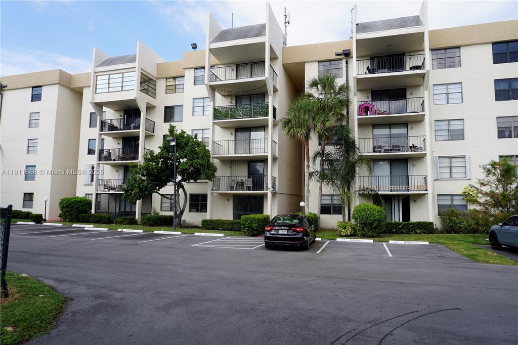 Photo of 6195 Rock Island Rd #204, Tamarac, FL 33319 (MLS # A11911658)