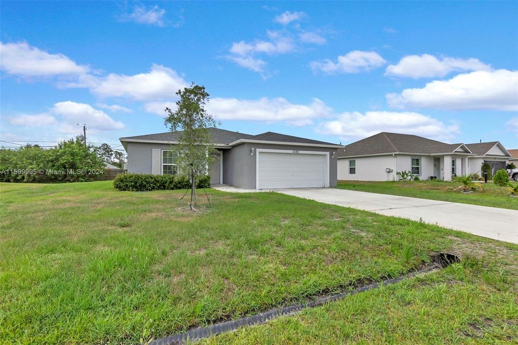 Photo of 1286 SW Patricia Ave, Port Saint Lucie, FL 34953 (MLS # A11599995)