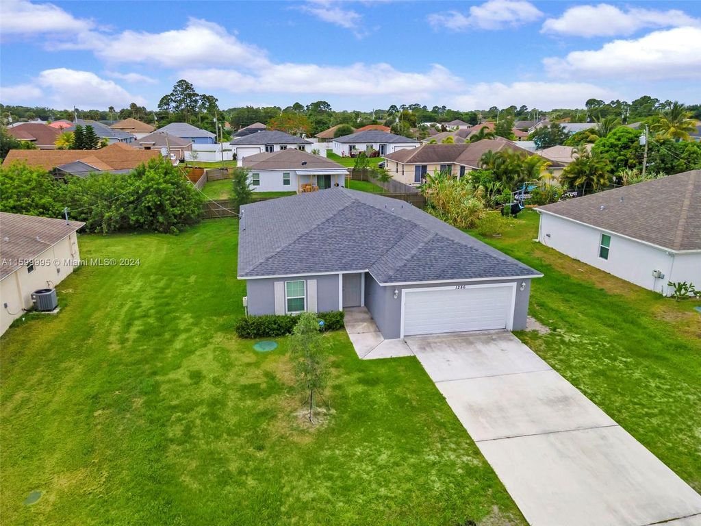 Photo of 1286 SW Patricia Ave, Port Saint Lucie, FL 34953 (MLS # A11599995)